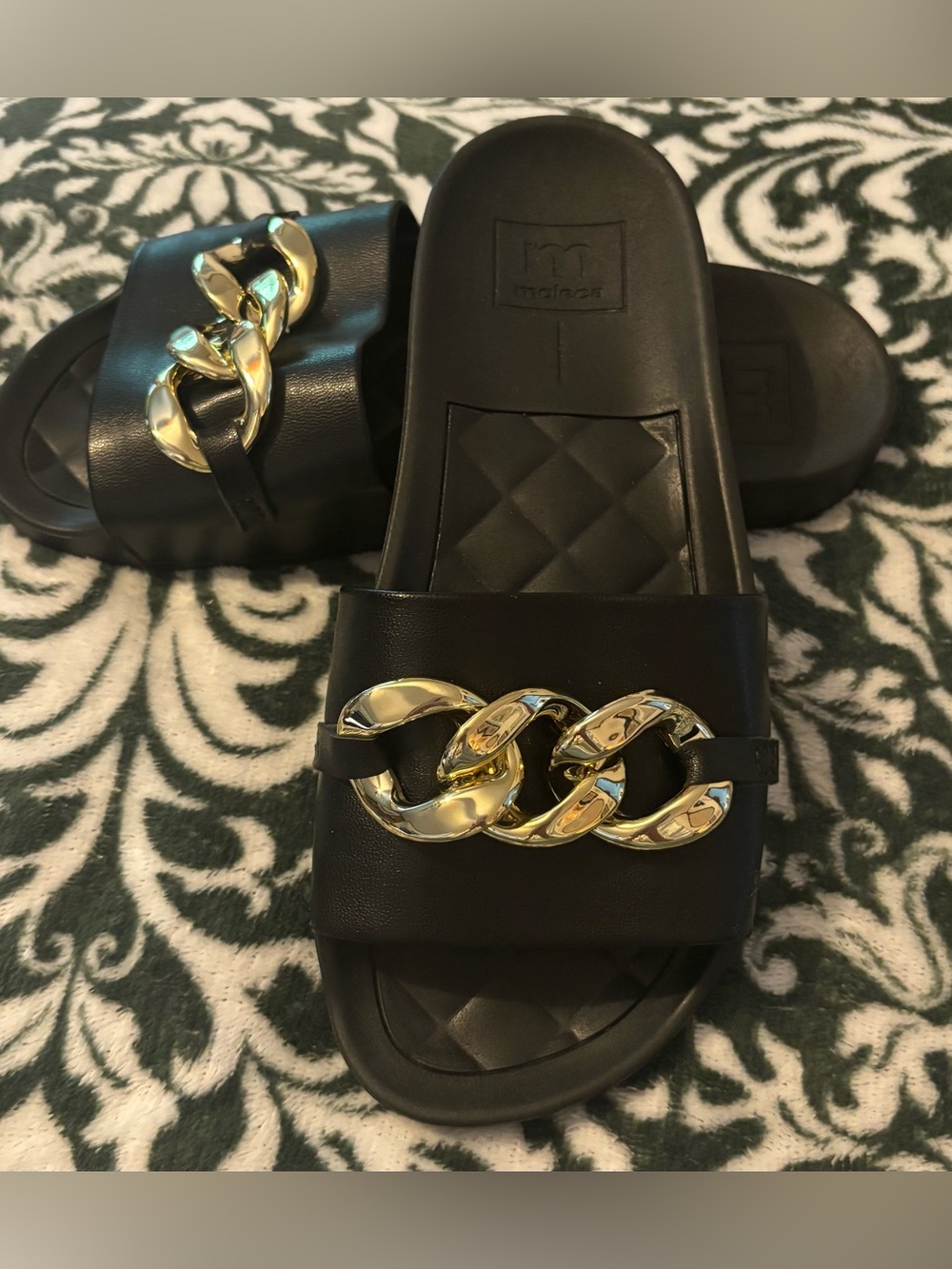 Women’s Black Slide Sandals with Gold Chain Accent
